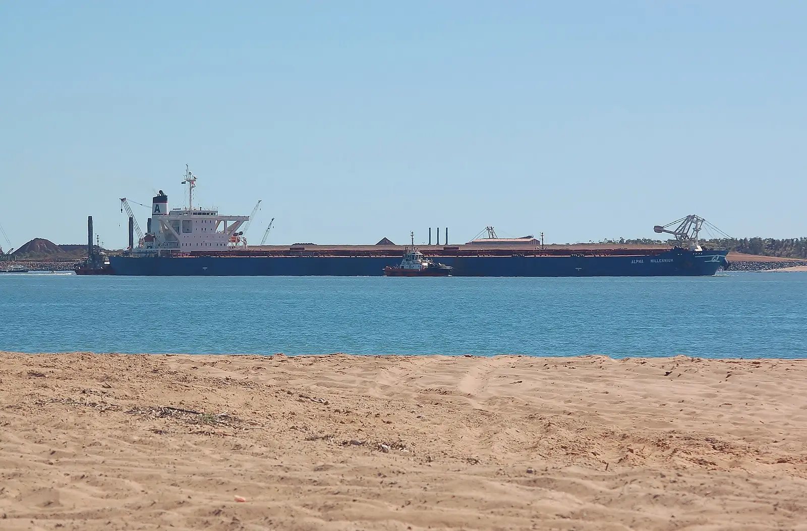 Bulk carrier Alpha Millennium leaving Port Hedland, Western Australia, loaded with iron ore