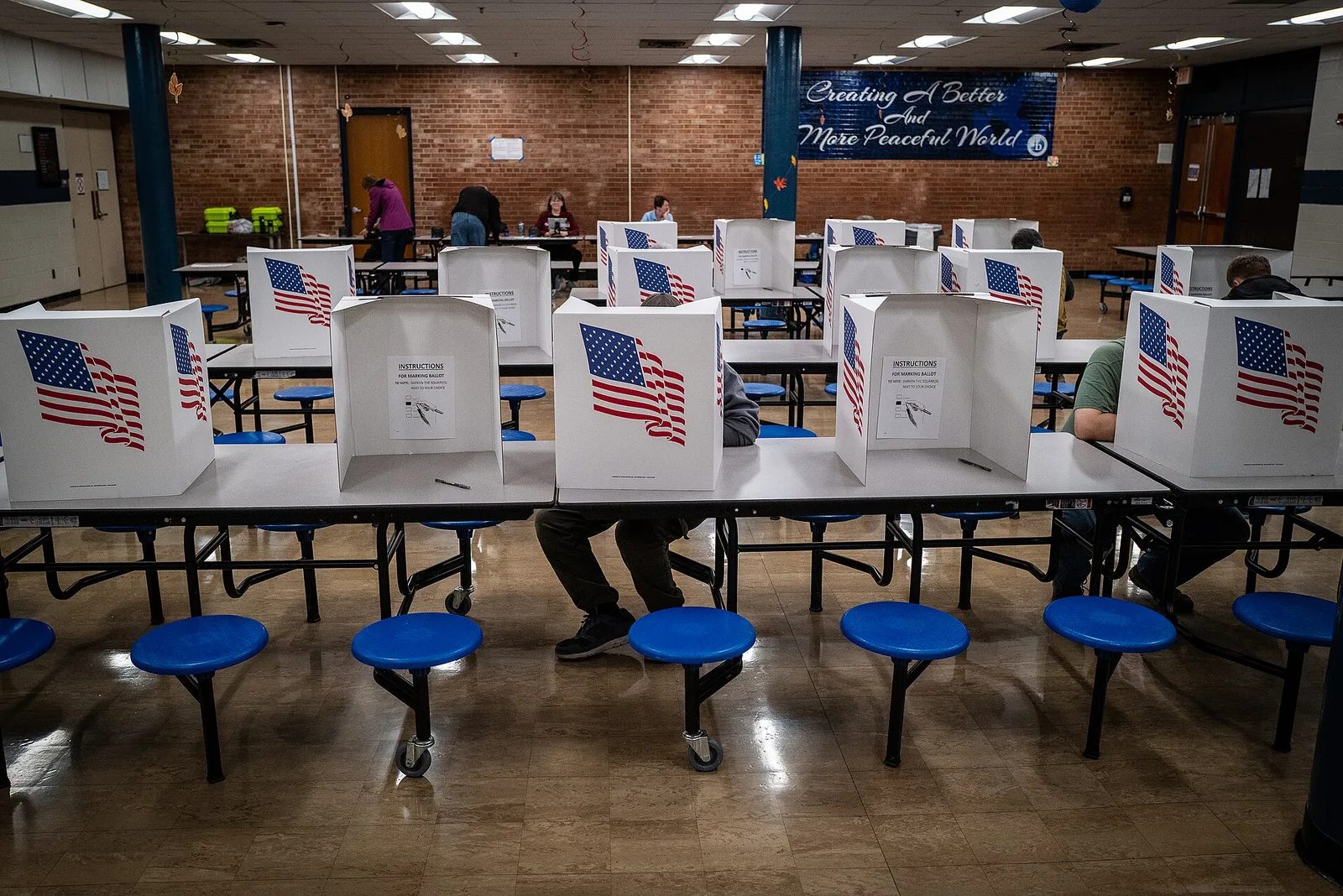 Voting booths set up in a school cafeteria serving as a polling place in Des Moines, Iowa