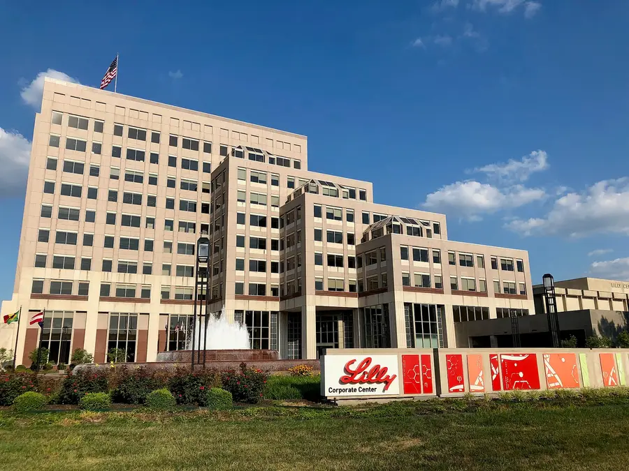 Eli Lilly (LLY) Corporate Center headquarters building and fountain in Indianapolis, Indiana