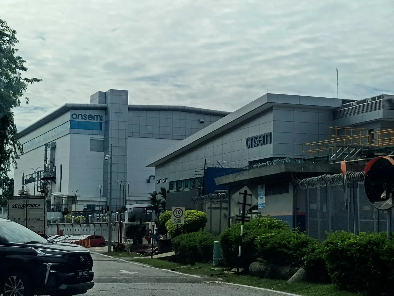 onsemi production buildings in Senawang, Malaysia, seen from the plant access road