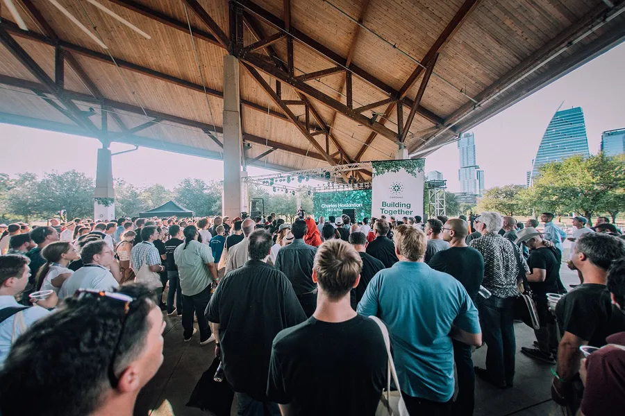 Attendees gathered around the Cardano Building Together stage at Consensus 2022 in Austin Texas