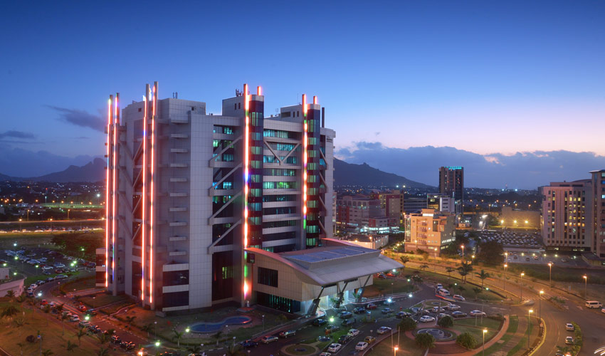 Ebene CyberCity at dusk, the Mauritius district named in the Hantec Markets terms