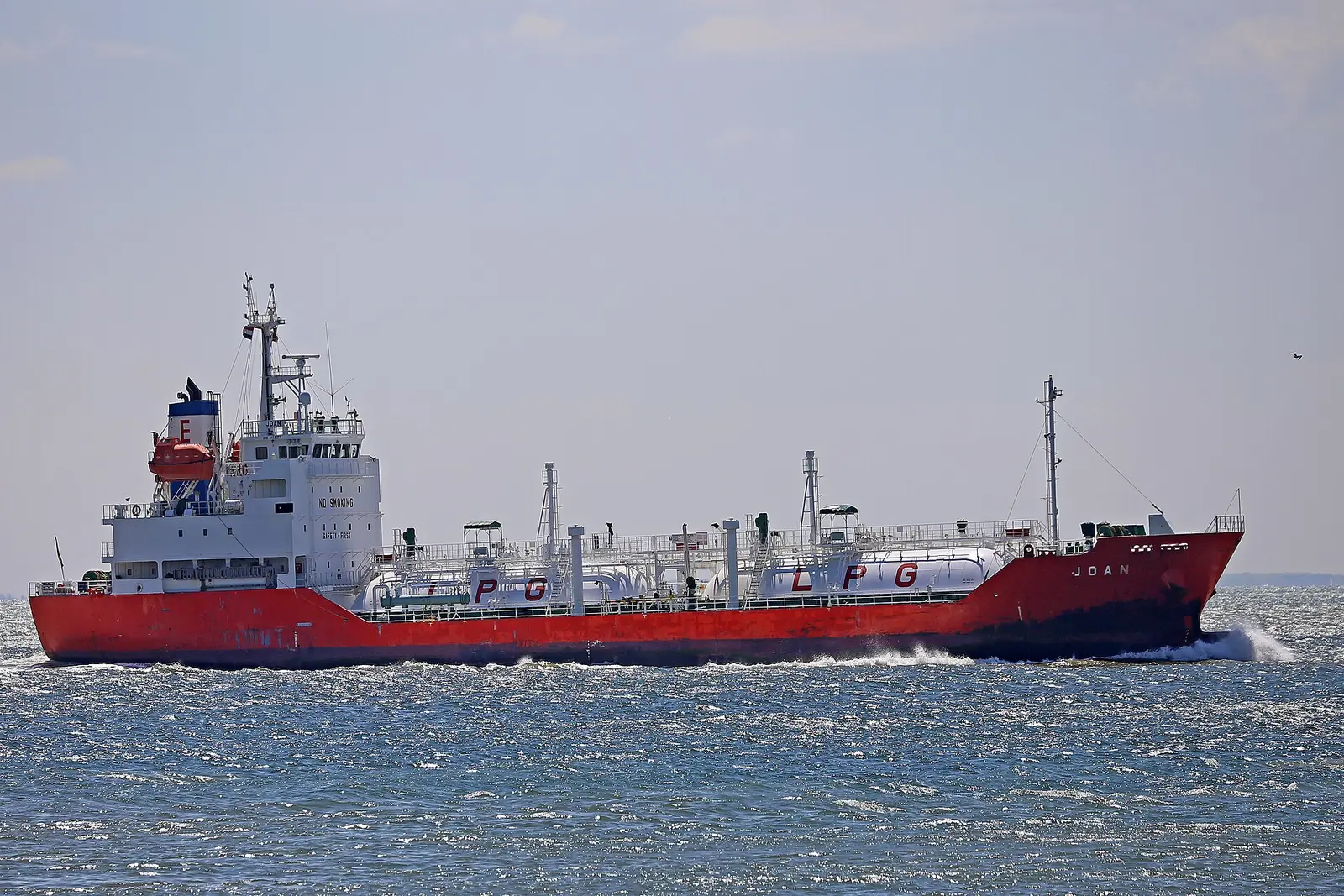 LPG carrier Joan under way at sea with its pressurised propane cargo tanks marked LPG on deck