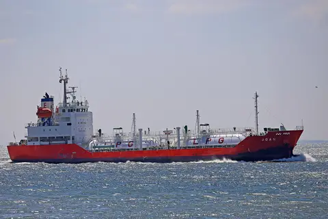 LPG carrier Joan under way at sea with its pressurised propane cargo tanks marked LPG on deck