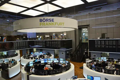 Trading floor of the Frankfurt Stock Exchange under the Boerse Frankfurt sign