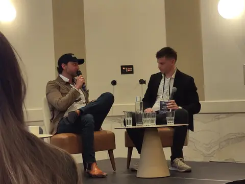 Two speakers on stage during a panel discussion at the EthCC 2026 Ethereum conference