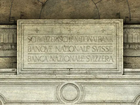 Carved trilingual nameplate reading Schweizerische Nationalbank, Banque Nationale Suisse, Banca Nazionale Svizzera on the Swiss National Bank head office at Buerkliplatz in Zurich