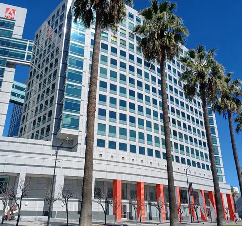 Adobe East Tower office building with the Adobe logo in downtown San Jose, California