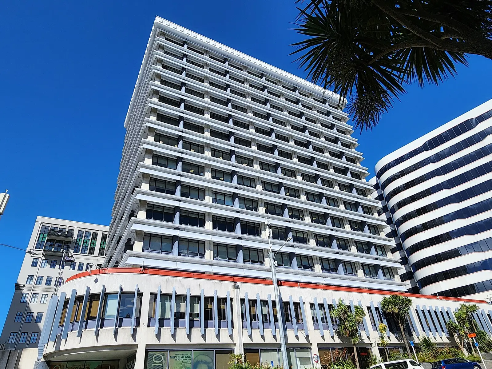 The Reserve Bank of New Zealand head office on The Terrace in Wellington photographed from street level under a clear sky
