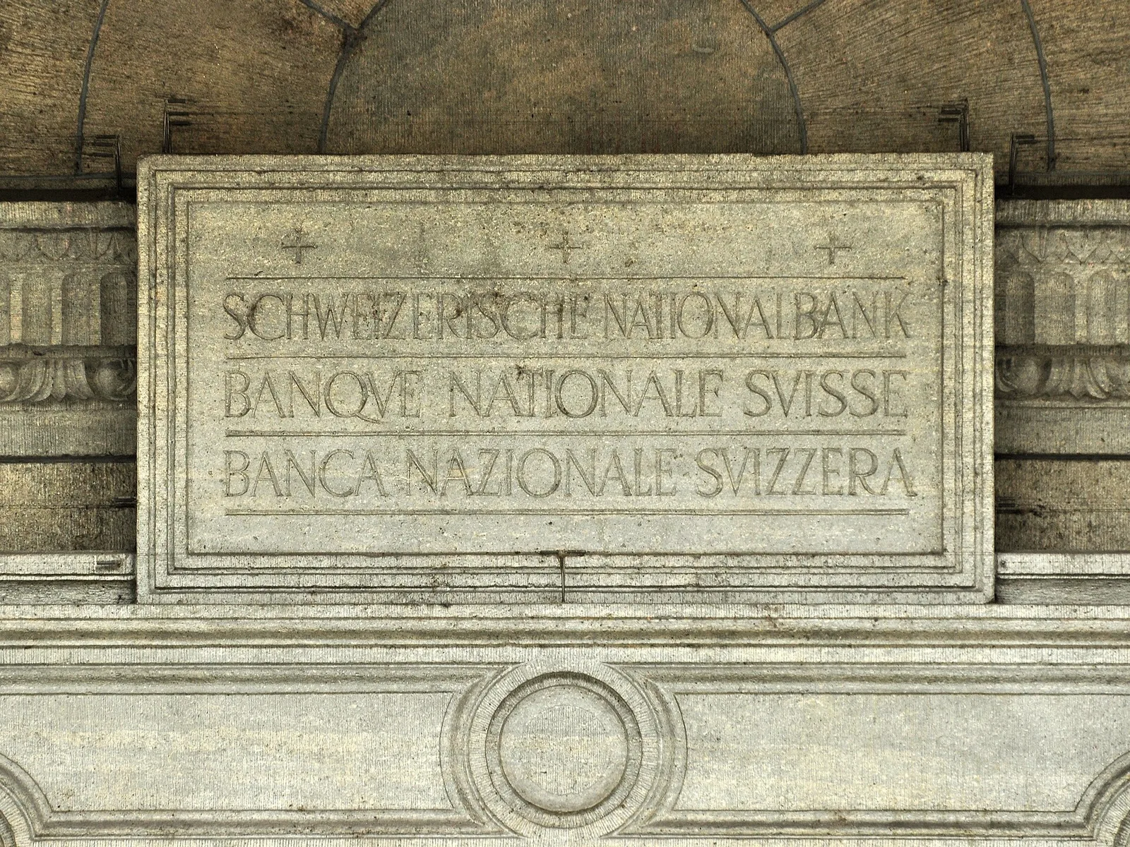 Carved trilingual nameplate reading Schweizerische Nationalbank, Banque Nationale Suisse and Banca Nazionale Svizzera on the Swiss National Bank building at Buerkliplatz in Zurich