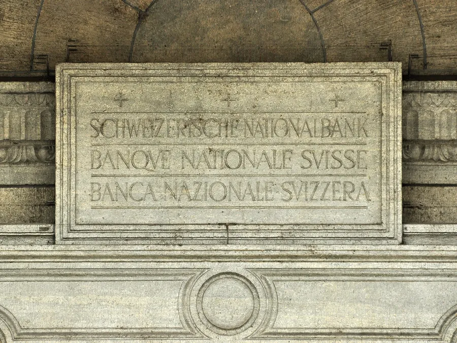 Carved trilingual nameplate reading Schweizerische Nationalbank, Banque Nationale Suisse and Banca Nazionale Svizzera on the Swiss National Bank building at Buerkliplatz in Zurich