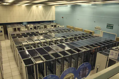 Server racks inside the CERN data centre, including cabinets marked World Wide Web servers and mail servers, photographed on 12 March 2010.