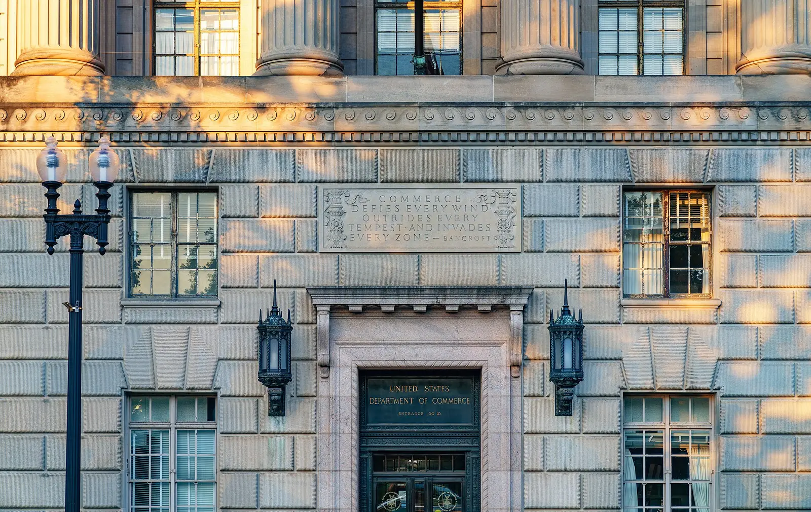 Stone entrance of the Herbert C. Hoover Building, headquarters of the US Department of Commerce in Washington