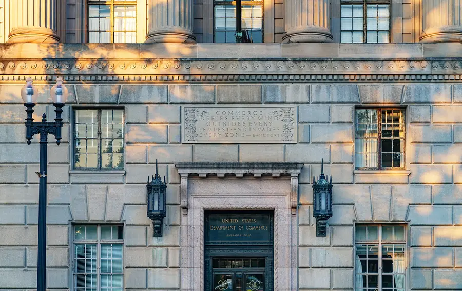 Stone entrance of the Herbert C. Hoover Building, headquarters of the US Department of Commerce in Washington